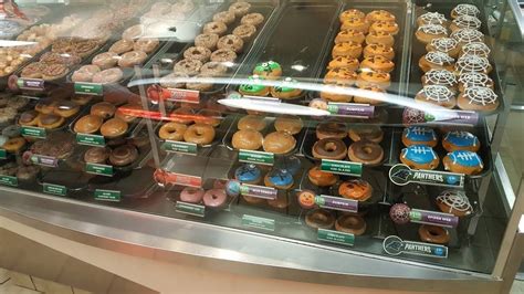 Krispy kreme greenville nc - Order online or visit the shop at 300 E Tenth St, Greenville, NC 27858. Enjoy fresh doughnuts, coffee, hot light hours, delivery, catering, rewards, gifts and more.